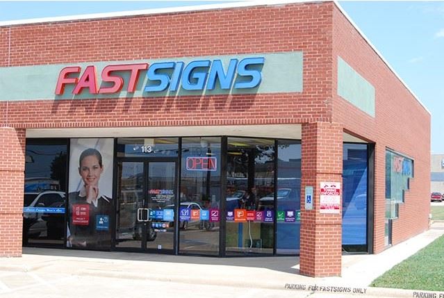 The storefront of one of Mark Glenn's FASTSIGNS